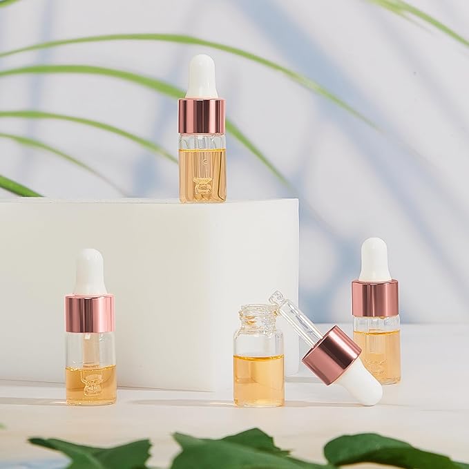 100 Pcs Mini Glass Oil Dropper Bottle Bulk, Clear Essential Small Empty Bottles Sample Containers Perfume Liquid Vials with Cap for Traveling (3 ml,Rose Gold)