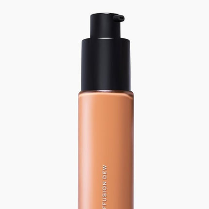MAKE Beauty Diffusion Dew Skin Tint. Sheer to Medium Coverage Radiant Finish. Blurring, Smoothing, and Brightening for Glowing Complexion. Enhanced with Niacinamide and Adenosine. Suede 12