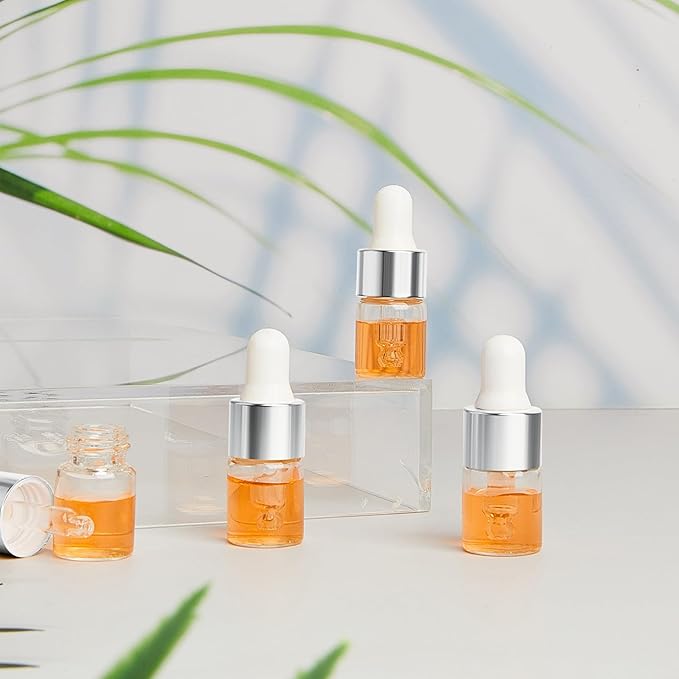 100 Pcs Mini Glass Oil Dropper Bottle Bulk, Clear Essential Small Empty Bottles Sample Containers Perfume Liquid Vials with Cap for Traveling (2 ml,Silver)