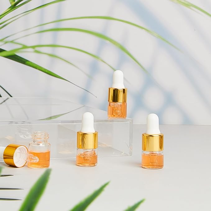 100 Pcs Mini Glass Oil Dropper Bottle Bulk, Clear Essential Small Empty Bottles Sample Containers Perfume Liquid Vials with Cap for Traveling (1 ml,Gold)