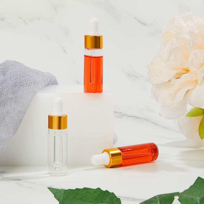 200 Pcs Mini Glass Oil Dropper Bottle Bulk, Clear Essential Small Empty Bottles Sample Containers Perfume Liquid Vials with Cap for Traveling (5 ml,Gold)