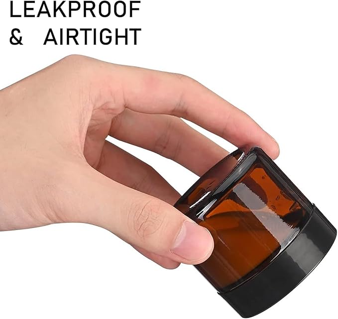 24 Pack 2 oz Round Amber Glass Cosmetic Jars with Inner Liners and Black Lids, Travel Jars, Refillable Containers for Makeup, Cream, Lotion, Sugar Scrubs, Eye Shadow, Slime, Paint, Jewelry