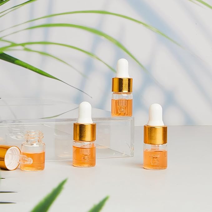 200 Pcs Mini Glass Oil Dropper Bottle Bulk, Clear Essential Small Empty Bottles Sample Containers Perfume Liquid Vials with Cap for Traveling (2 ml,Gold)