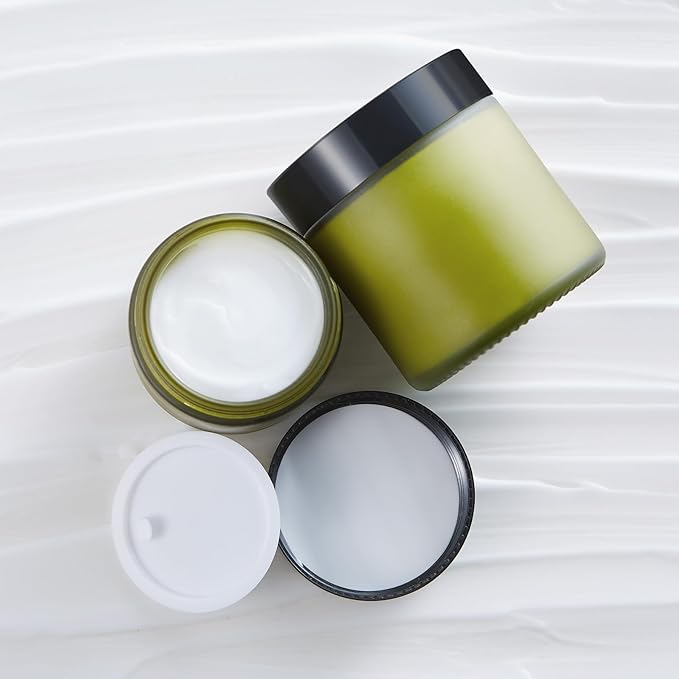 2 oz Small Glass Jars with Lids, Bumobum 48 pack Round Green Glass Candle Jars with Black Lids, White Labels & Inner Liners, Empty Cosmetic Containers for Cream, Lotion, Slime, Ointment