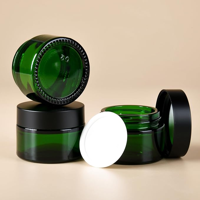 2 oz Reusable Green Glass Container Jars 24 Pack with Wide-mouth Leak Proof Cap and Inner Pull-On Lid for Travel Storage Makeup, Face Creams, Body Lotions, DIY Crafts or Others