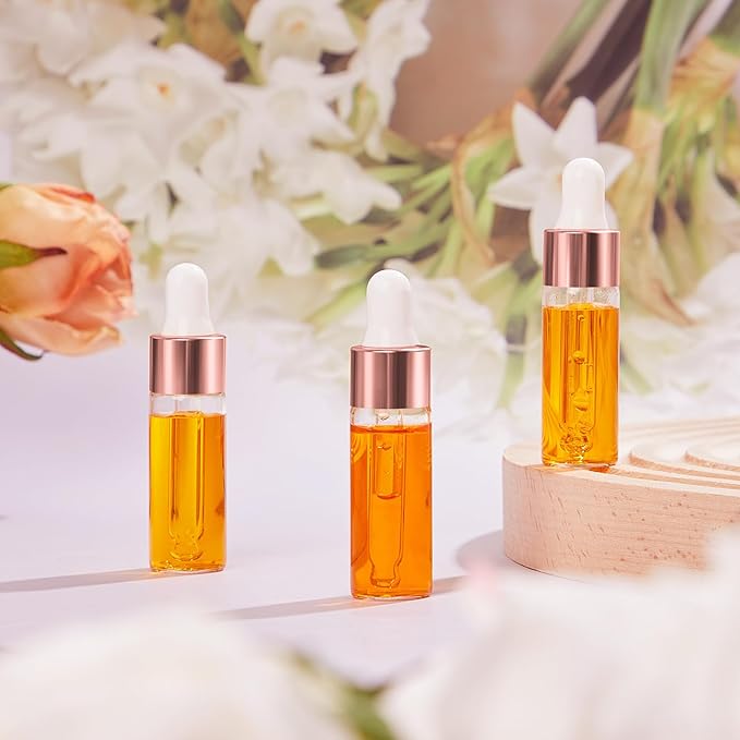 100 Pcs Mini Glass Oil Dropper Bottle Bulk, Clear Essential Small Empty Bottles Sample Containers Perfume Liquid Vials with Cap for Traveling (5 ml,Rose Gold)