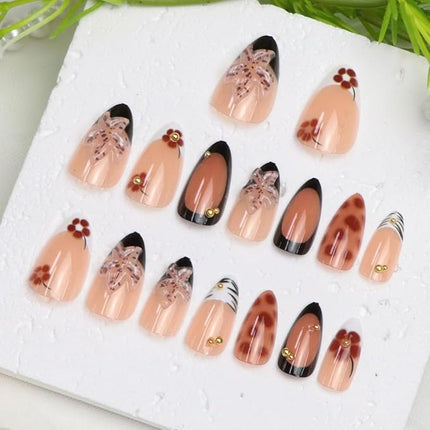 Short Press on Nails Almond Fake Nails with 3D Flower Gold Pearl Designs French Tip Nails Press ons Black Nude White Brown Acrylic Glossy Glue on Nail for Women 24 Pcs