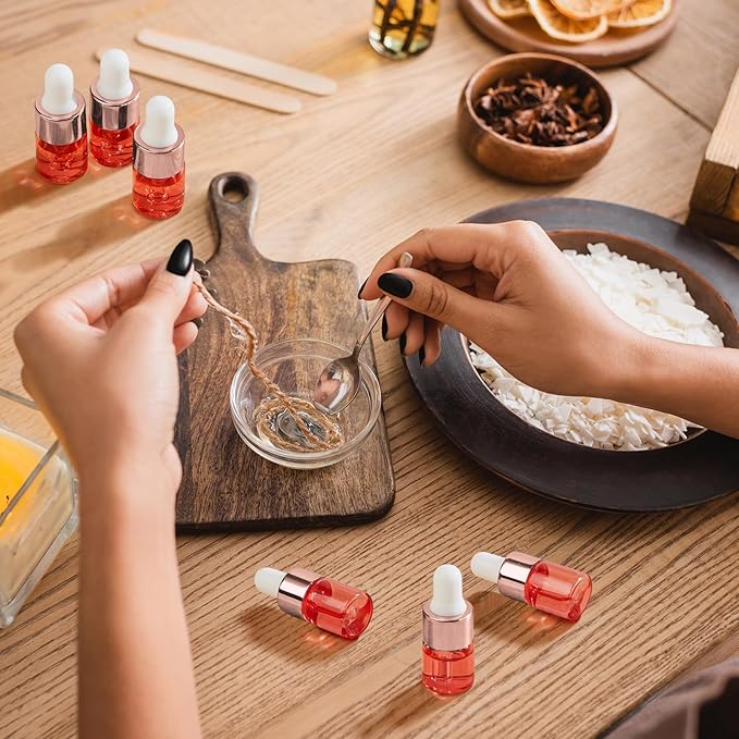 100 Pcs Mini Glass Oil Dropper Bottle Bulk, Clear Essential Small Empty Bottles Sample Containers Perfume Liquid Vials with Cap for Traveling (2 ml,Pink Body)