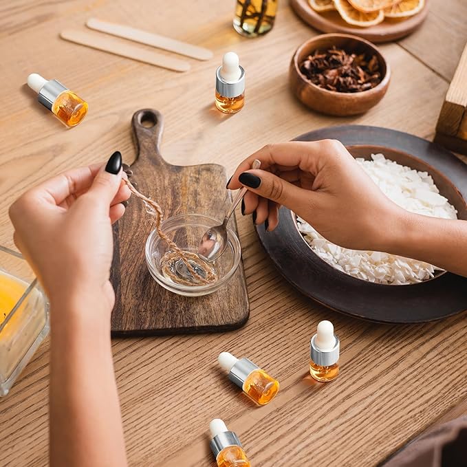 100 Pcs Mini Glass Oil Dropper Bottle Bulk, Clear Essential Small Empty Bottles Sample Containers Perfume Liquid Vials with Cap for Traveling (1 ml,Silver)